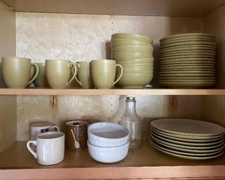 2 shelves of mugs and plates and blue bowl $20 all 