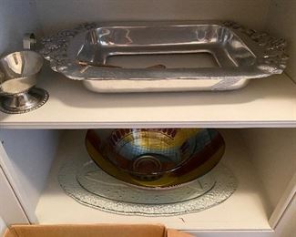 2 shelves of silver-plate and trays $10