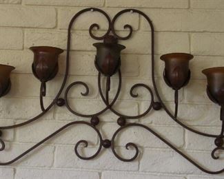 #5.  $60.00.  Metal wall sconce with glass vessels 50” long X 25.75” height