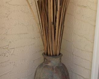 #52. $50.00.  Decorative pot with reeds 