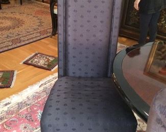 8 high back eggplant dining chairs=
