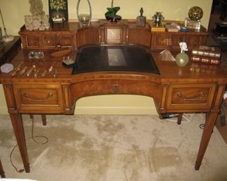 Vintage Drexel writing desk with leather inset top, tambour doors and built in clok