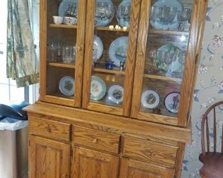 2 piece cabinet with slots for plate display. Base: 51" x 34" x 18.5" deep.  Top: 51" x 43" x 13" deep