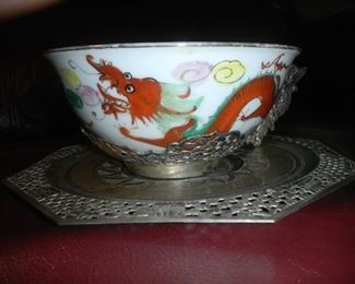 antique china tea cups with silver saucers