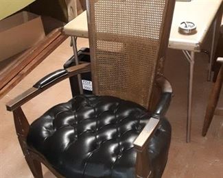 Cane backed chair with leather seat
