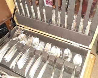 Flatware and case. 1847 Rogers Bros. Flair. Service for 12