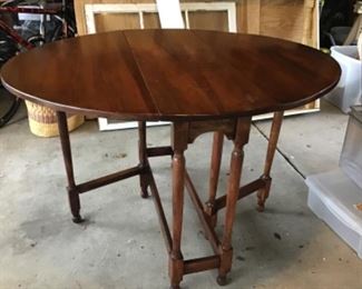 walnut gateleg table $99, each side folds down