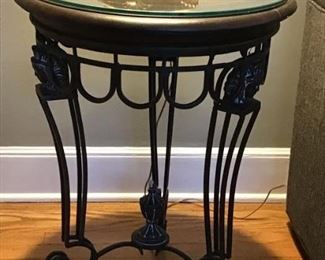 Well this picture does not do it justice- gorgeous classic woman face cast metal table $250  - 27 inch high and 20 inch diameter top