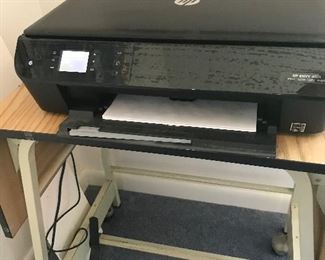 HP envy model number 4501 printer cute little metal typing table is 21 wide 26 1/4 tall to drop down 9 inch leafs 