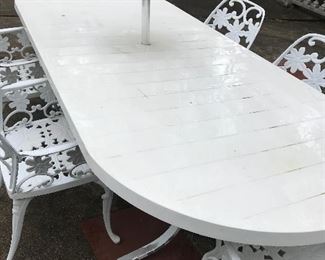 large table $145.00, set of 4 chairs $245, umbrella 15.00