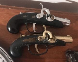 $ 25-Set of 2, 1960-70's Flintlock Pistol Lighters, not sure if they work
