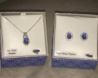 $50-Set-Necklace box is marked Blue and Clear Crystal, Earring box is  Marked Cubic Zirconia and Sapphire 