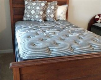 Gorgeous oversize full head a foot board with frame. Second Brand New set of Kingsdown pillow top mattress and box springs.