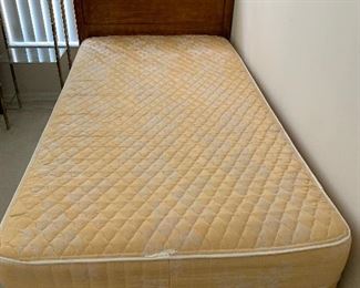 There are 2 sets of twin mattresses/box springs with headboards