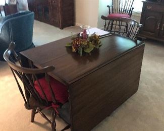 Drop Leaf Cherry Dining Table
Excellent Condition and has  2 Arm and 4 Side Chairs