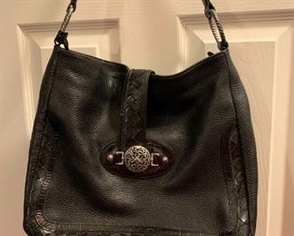 Large black Brighton Leather shoulder bag . Beautiful floral print .. open inside, with inside side pockets 
$90