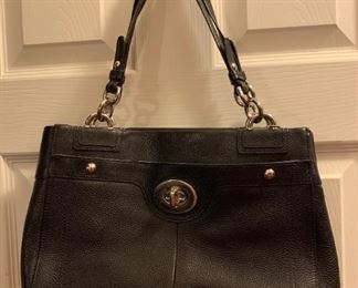 Black Leather carry all 
Center pocket and two outside. Pockets . 99.00 