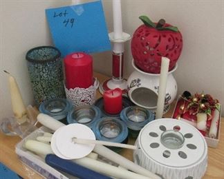 Lot 49 - Large lot of candles and holders $20.00