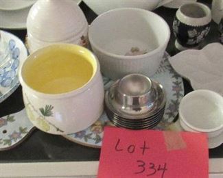 Lot 334 - Large lot of cups, salt & pepper etc. 20.00