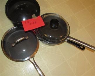 Lot 348 - Pots and pans with lids $45.00
