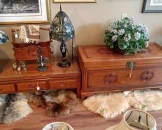 Living Room:  Rose Wood Coffee Table,  Rosewood Chest, Pelts, Lamps
