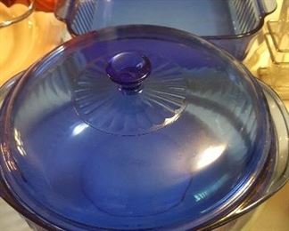 315.2   PIECES OF BLUE PYREX 2 PLASTIC LIDS AND ONE GLASS LID $