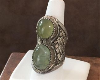 Size 7 1/2 massive woven sterling silver saddle ring featuring two  gorgeous smooth prehnite cabochons. STUNNING!  $226
