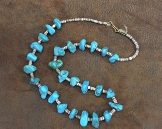Vintage 18" Santo Domingo Native American turquoise nugget and pen shell heishi necklace with hook and eye clasp. $198
