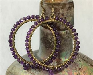 Vermeil (gilded sterling silver) hoop earrings wire-wrapped with beautiful faceted amethyst beads.  Large 1 1/2" diameter, stamped 925.  $98
