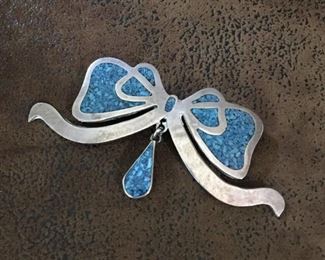 Vintage extra large Mexico sterling silver brooch in the shape of a bow with turquoise chip inlay.  3 1/2" x 1 3/4", stamped MEXICO 925 TC-60.  $96

