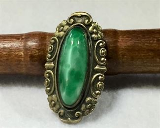 Antique Art Deco brass and mottled green lucite brooch, 3/4" x 1 3/8".  $48
