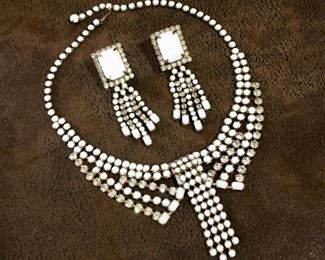 Collectible Designer vintage clear rhinestone & milk glass necklace and earrings set. Adjustable necklace length up to 16 1/2" long.  Signed Hobe on the back of necklace. Matching fringe clip earrings are 3 inches long and 3/4" wide.  $188 set.
