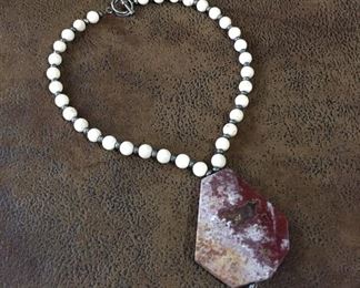 Beautiful 16" artisan-made necklace with cream-colored 8mm jasper beads & sterling silver spacer beads. Huge 2" x 2 1/4"  jasper pendant.  $96
