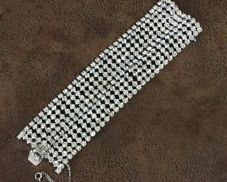 Vintage WIDE prong-set rhinestone bracelet with hidden box clasp and safety clasp. Length is 7 1/4", width is 1 7/8". $110

