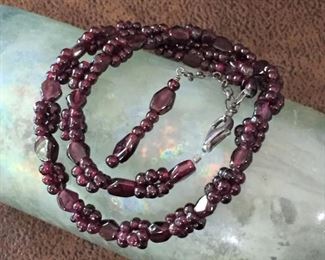 Pretty beaded garnet necklace with sterling silver clasp and extender chain. Length adjustable from 16"-18". Clasp stamped 925. $70
