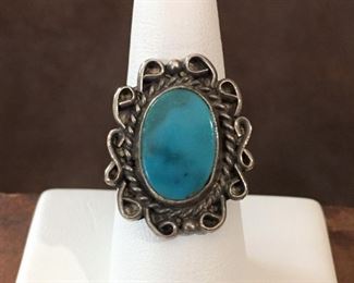 Size 8 beautiful old pawn Native American turquoise and sterling silver ring. Signed MAH and stamped STERLING inside the band. $100
