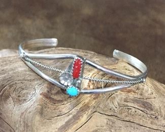 Old pawn Native American silver, turquoise and coral cuff.  5" inner circumference with 1 1/4" gap.  $120
