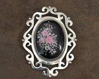 Gorgeous HUGE sterling silver brooch/pendant.  The flowers are three dimensional and captured in a large clear lucite cabochon.  It measures 2 7/8" x 2 1/8".   It is stamped STERLING on back.  Fabulous.  $140
