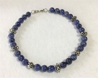 Vintage 15" sodalite and sterling silver necklace featuring beautiful pierced sterling beads. $75
