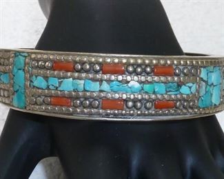 Big chunky Tibetan turquoise, coral and silver bangle bracelet.  $244