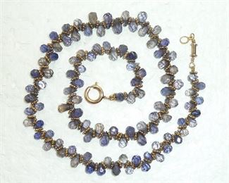 16" vintage gold-filled necklace with natural faceted iolite crystals.  The name iolite comes from ios, the Greek word for violet.  Clasp is marked 1/20th 14k g.f.  $140