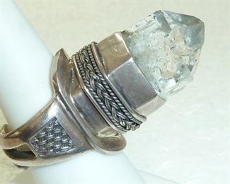 This awesome one of a kind rock crystal ring stands up one inch from the base! It is sterling silver, signed ALXEN (I think), and marked 925.  The crystal looks much better in person with lots of natural occlusions.  $265