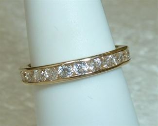 14k yellow gold with sparkly CZs all around the band.   $200 