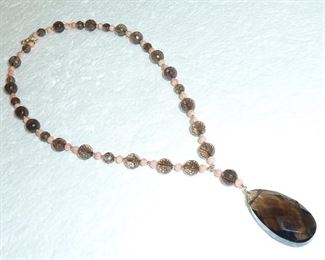 Coral, and smoky topaz necklace with 14k gold clasp.  Faceted topaz drop is 1.5" long, and necklace is 16".   $120