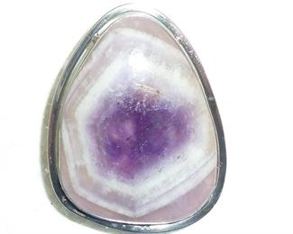 Beautiful polished amethyst and sterling silver brooch/pendant with hidden bale.  2" long by 1 3/8" wide.  Stamped 925 ISRAEL and signed with a tiny stamp that looks like AW.  $96