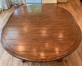 Table with two extensions in great condition. Dimensions 52" round - 18" extensions. Price $950