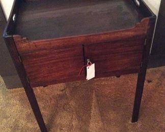 Mid 19th century mahogany side table w/gallery top on square supports.