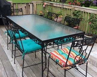 Wrought iron Rectangle table and chairs w/ pillows