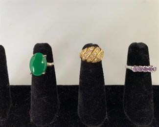 Lot of 3 Costume Rings. Ring with Green Stone Signed Vogue
