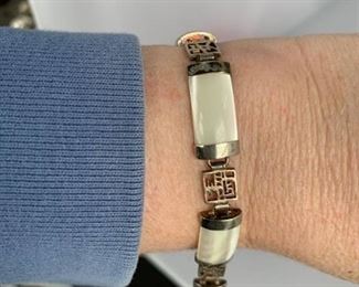 Sterling Silver Bracelet with Mother of Pearl and Oriental Plated Accents.